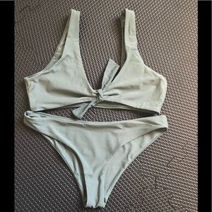 Dark green bathing suit. Worn once.